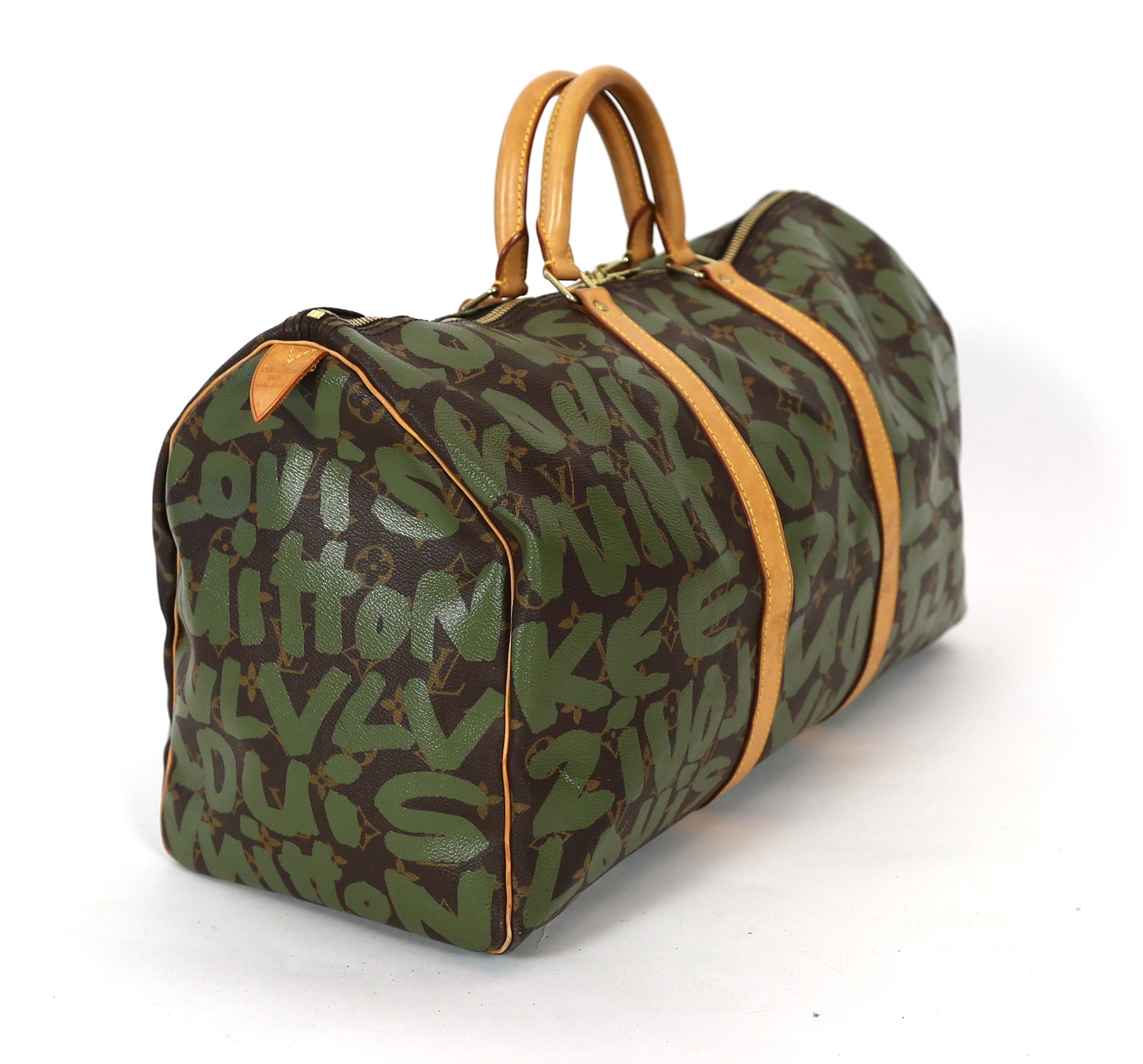 A vintage 2001 Louis Vuitton Stephen Sprouse Khaki Green Monogram Graffiti Keepall 50